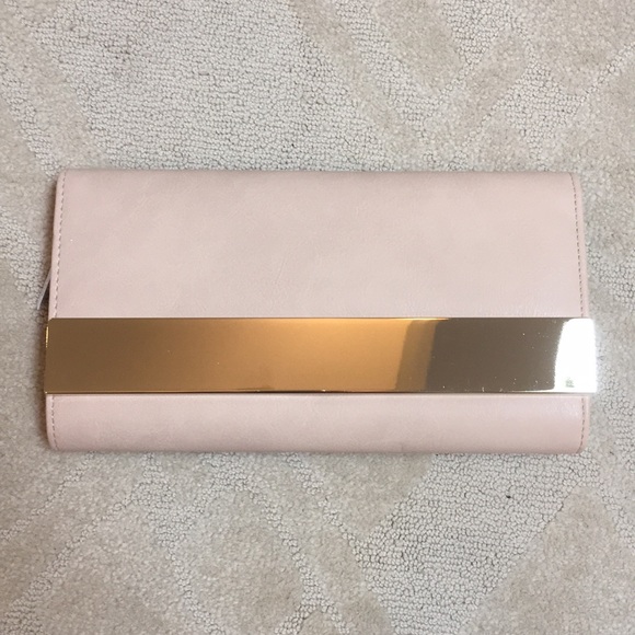 Aldo Handbags - Nude clutch with gold accents